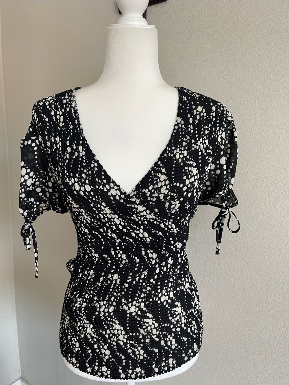 NICOLA Black and White Dot-Print Ruched Wrap Blouse